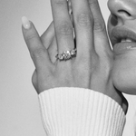 Round diamond trilogy engagement ring 